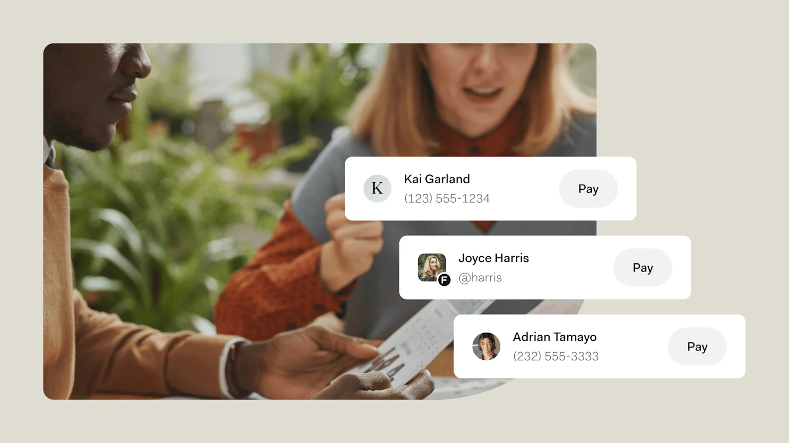 Two people reviewing paperwork together, with overlapping app cards for paying contractors Kai Garland, Joyce Harris, and Adrian Tamayo