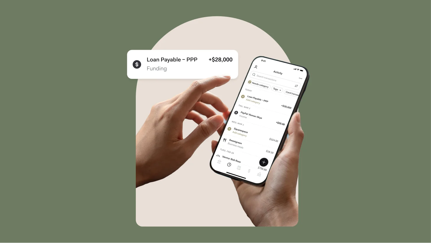 Hands holding a phone showing a $28,000 PPP loan deposit at the top of an account activity feed, alongside transactions like Squarespace and Sweetgreen
