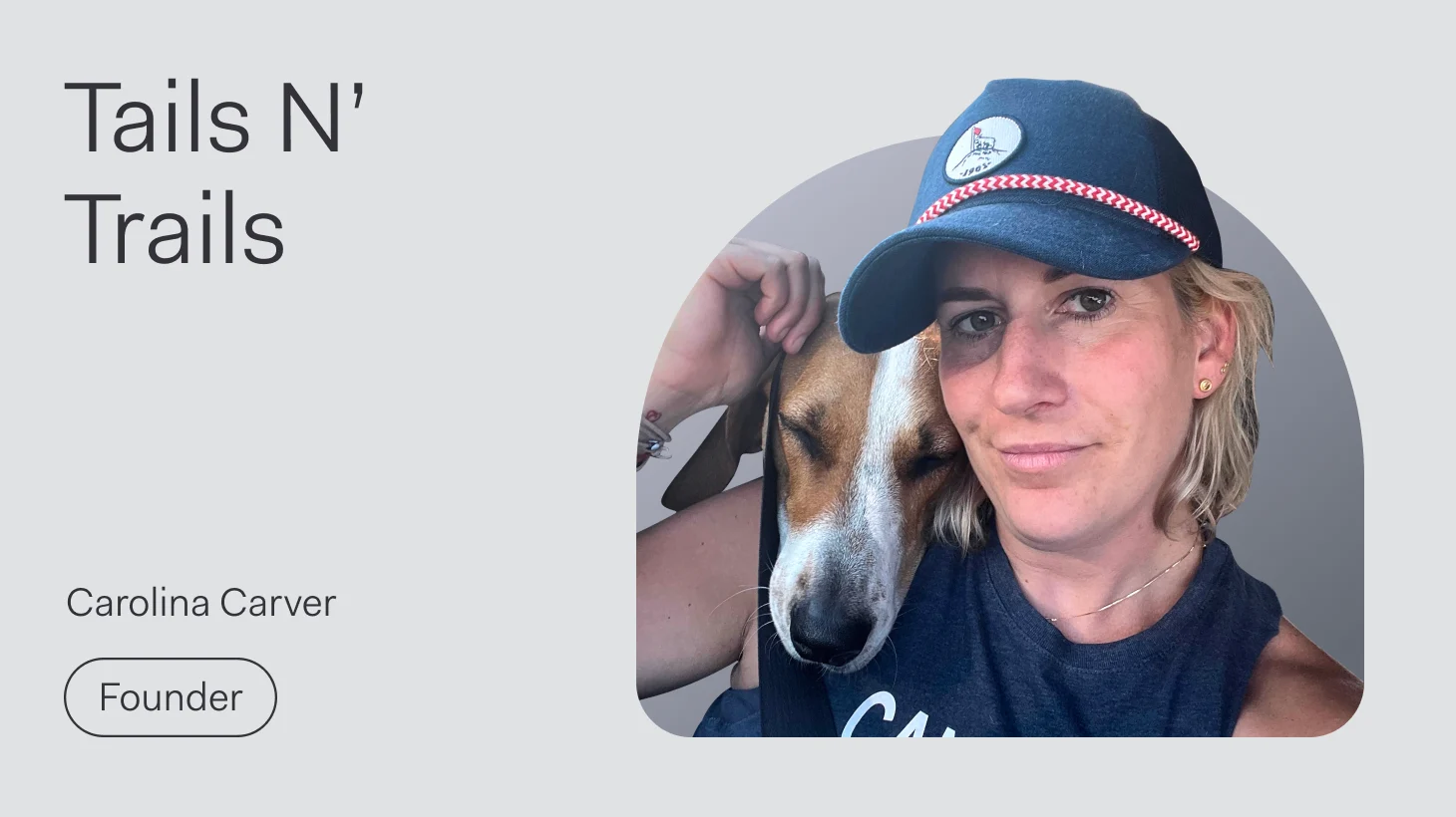 Carolina Carver, founder of pet services company Tails N' Trails, smiles closely with her dog