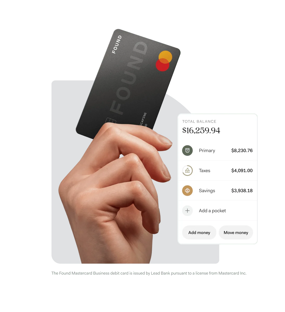 A hand holding a black Found debit card in front of the Found app's banking screen, showing an account balance split across Pockets