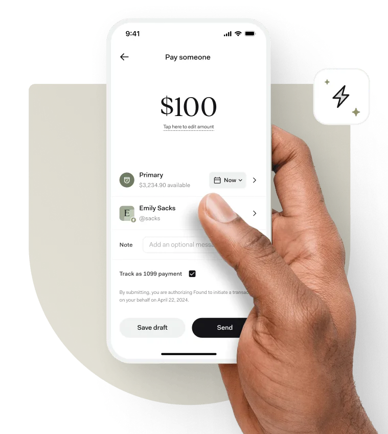 A hand holding a phone showing the Found app’s Pay someone screen, sending $100 from the Primary Pocket and flagged to track as a 1099 payment